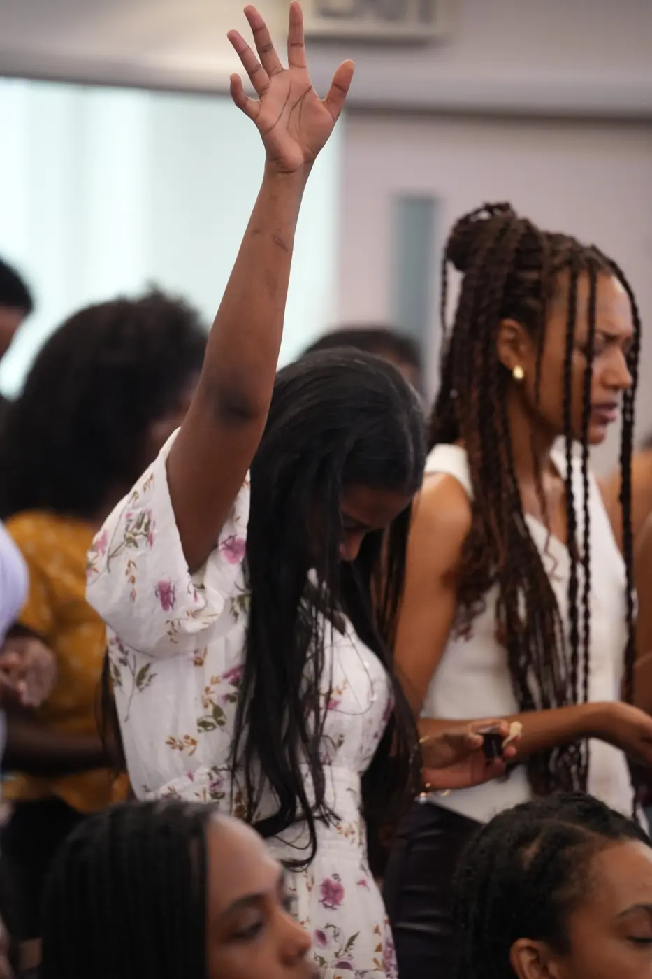 A worshiper praying during service