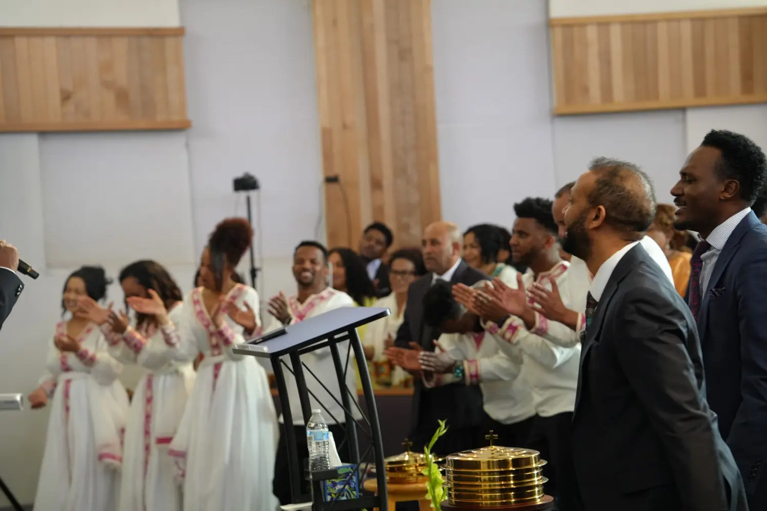 The Shalom choir leading worship